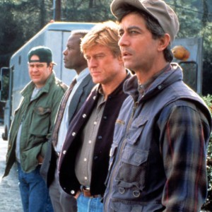 Screenshot from Sneakers, with members of the team lined up for the mission