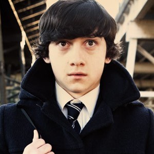 Craig Roberts, an anxious looking white teen with a shaggy Beatles haircut