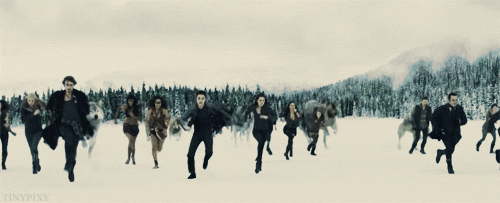 While running at the start of the battle, Edward flies through the air and punches a Volturi
