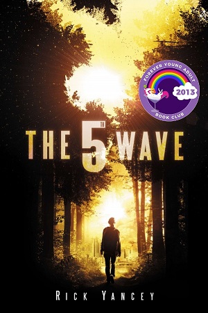 Cover of The 5th Wave, with a girl walking, her back to the camera, through the woods to a city lit up in yellow light
