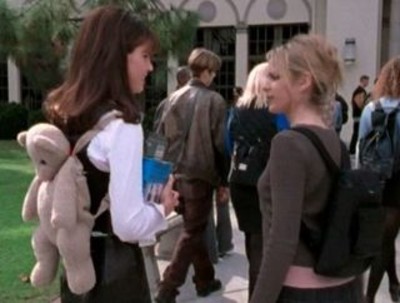 Cordelia talking to Buffy while wearing a backpack that looks like a teddy bear
