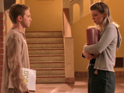 Oz meets Tara in the hallway.