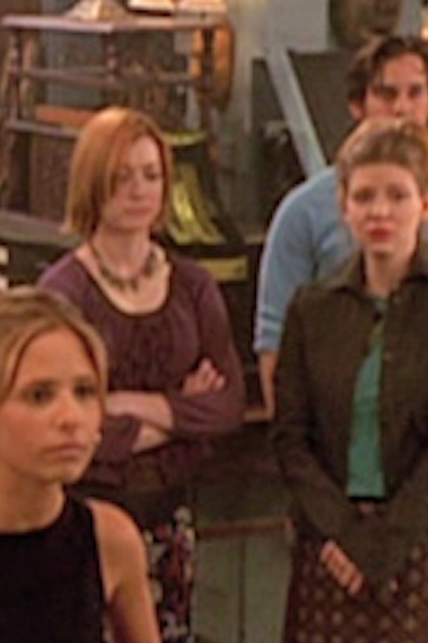 Buffy, Willow and Tara look on at Tara's shitty family.