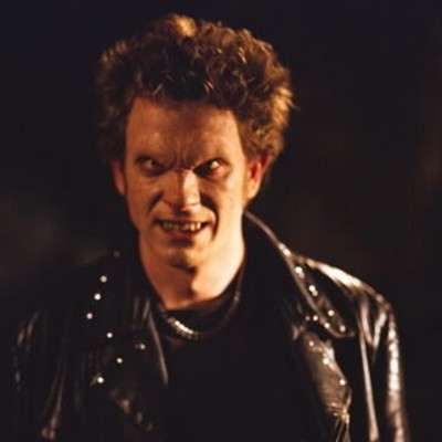 actor Tom Lenk as a vampire with spiked hair and a leather jacket