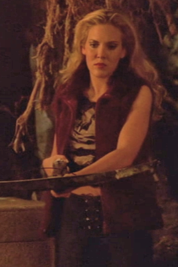 Harmony pointing a crossbow at Spike.