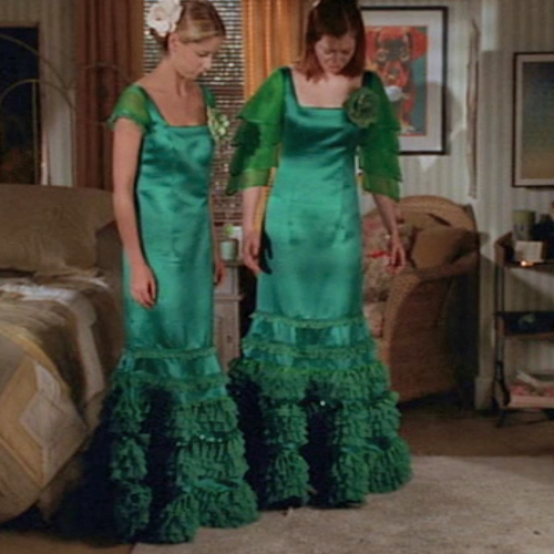 Buffy and Willow wear hideous emerald green bridesmaid dresses with ruffled bottoms