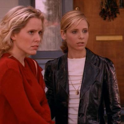 Anya and Buffy, who is wearing a black leather jacket