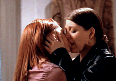 Willow and Tara embrace and share a passionate kiss