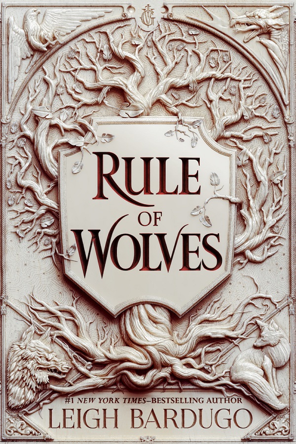 Cover of Rule of Wolves, featuring a carving of a tree and animals in something white like bone with the title in the middle