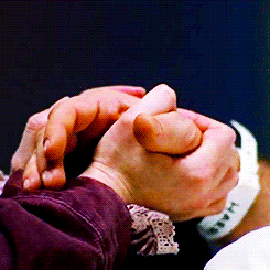 Willow and Xander's hands clasped