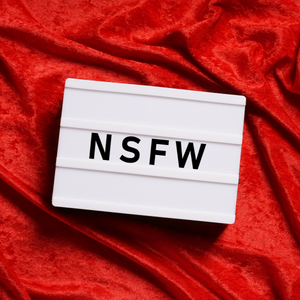 Red fabric with a sign that reads "NSFW" or "Not Safe for Work"