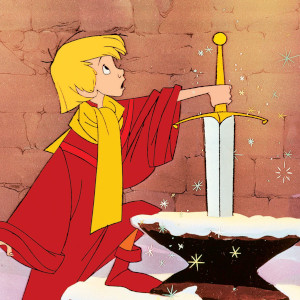 Young cartoon blond boy wearing a red robe and yellow scarf pulls a sword surrounded by sparkles from a snow-covered fixture