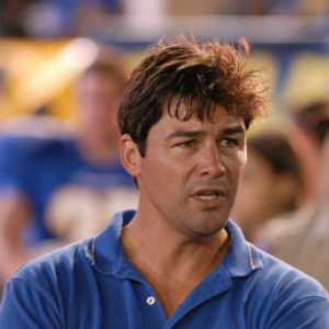 Close up of Coach Taylor from Friday Night Lights at a football game