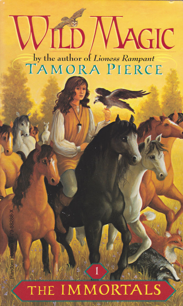 Cover of Wild Magic: a herd of horses while Daine rides one surrounded by other animals.