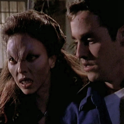 Xander is saved by vampire-faced Drusilla under his magic spell.