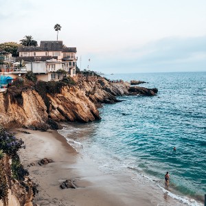 A large beach house on a cliff overlooking the ocean