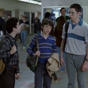 Three nerdy looking boys in the school hallway from Freaks and Geeks
