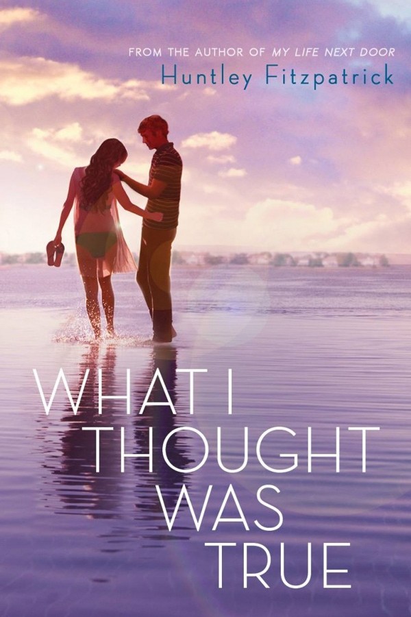Cover of What I Thought Was True with a girl and boy standing on the beach