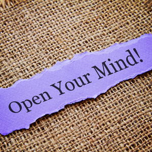A purple strip of paper that says Open Your Mind!