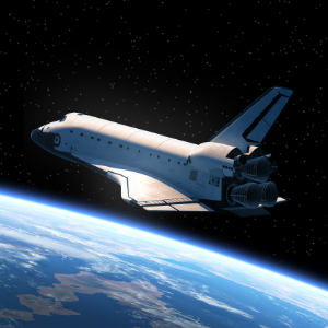 Space shuttle flying over earth in space