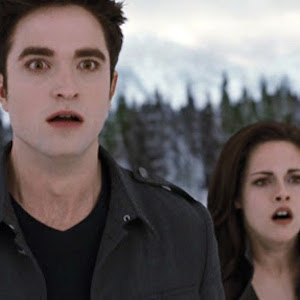 Edward and Bella from Twilight with shocked looks on their faces