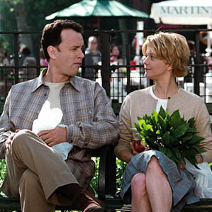 Joe Fox and Kathleen Kelly sit on a bench at the farmer's market