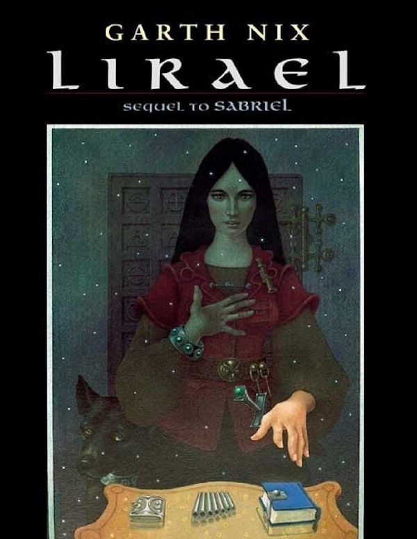 Cover Lirael: A girl reaches out over a table containing a pile of books, a pan flute, and a silver box