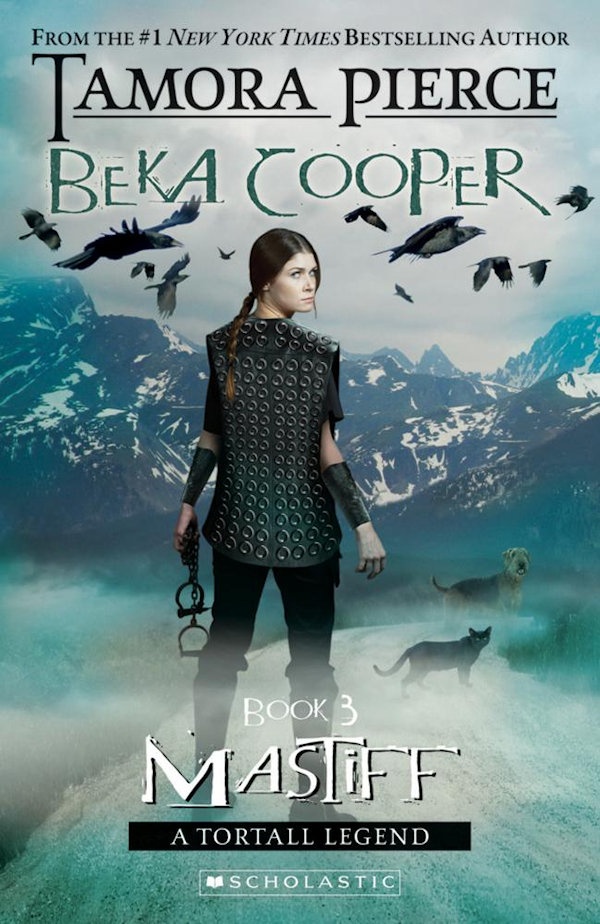 Cover of Mastiff: Beka looking over her shoulder standing on a mountain with her police dog and cat nearby and pigeons flying around.