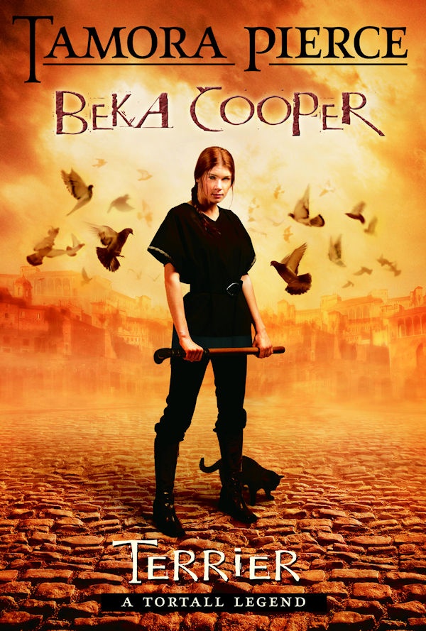 Cover of Terrier: Beka standing on a cobblestone street holding a bully stick with pigeons flying around her.
