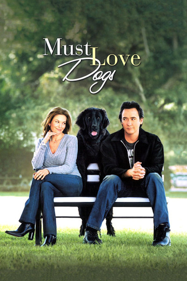 Must Love Dogs Poster: Diane Lane and John Cusack sit on a bench in a park with a dog between them.