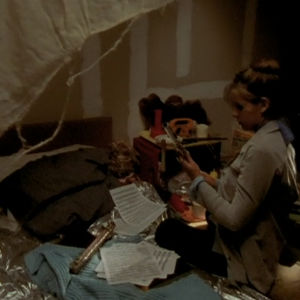 Buffy snooping around Marci's attic bedroom.