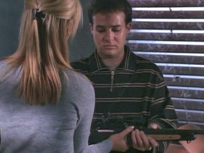 Buffy tries to take the gun from Jonathan