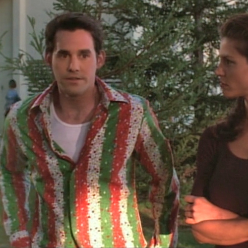 Xander wearing a hideous red, white, and green shirt.