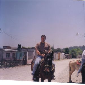 A much younger FYA dude Brian on a horse in Mexico