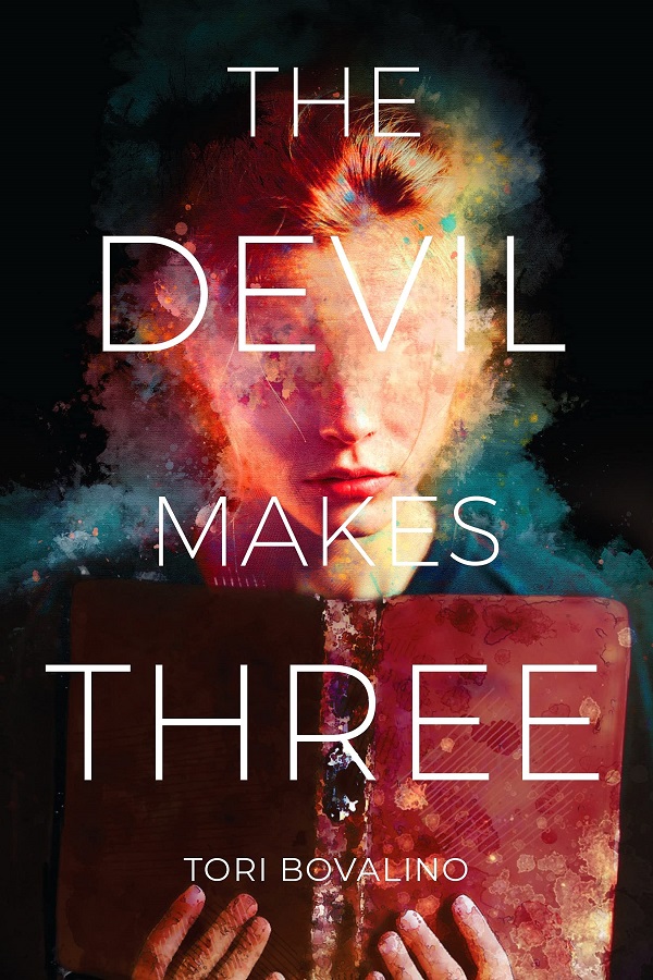 Cover of The Devil Makes Three. A girl with blank eyes reads an old book.
