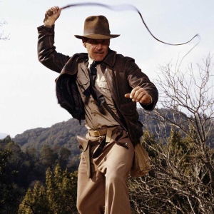 Harrison Ford as Indiana Jones, cracking his whip.