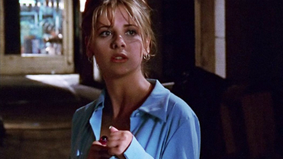 Buffy stands in a dark hallway with her fists up in "Welcome to the Hellmouth."
