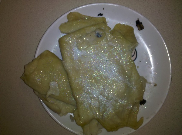 Plate of ravioli covered with edible glitter