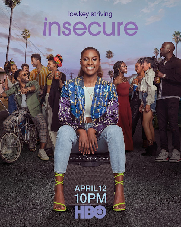 Insecure Cover: Issa sits on a milk crate on the street with the rest of the cast behind her.