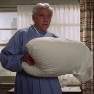 The brainwashed doctor from The Naked Gun, ready to smother a patient with a pillow