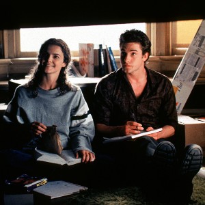 Scene from Felicity, with Felicity and Ben sitting on the floor of a dorm room with books