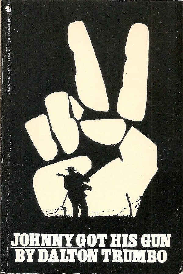 Cover of Johnny Got His Gun. Doughboy stands in front of giant hand flashing the peace sign.