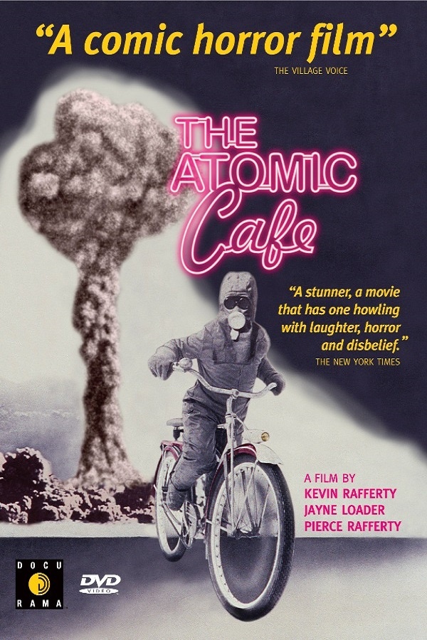 Movie Poster for the Atomic Cafe. A boy in a radiation suit rides a bike in front of a mushroom cloud