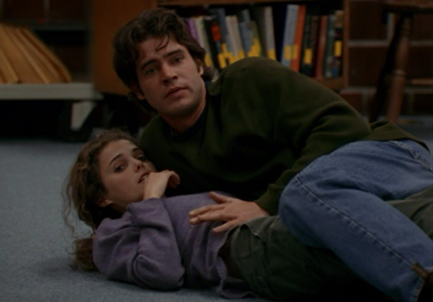 Felicity and Ben, on the floor of the library in a compromising position