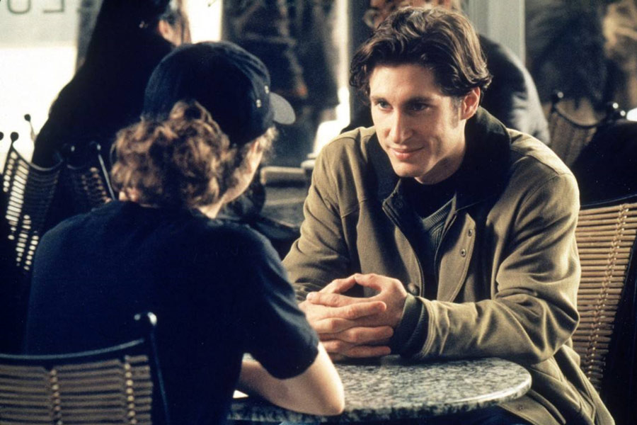 Todd Mulcahy, an awkward-looking guy, sitting at a Dean & Deluca table with Felicity