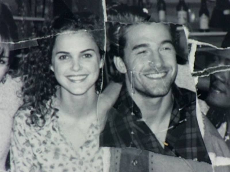 A black and white photograph torn up and taped together with Felicity and Ben next to each other