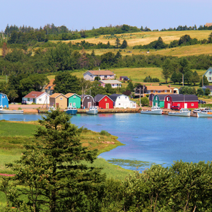 Colourful houses along the edge of a body of water