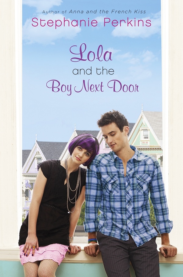 White girl with hair in a short dark bob with purple streaks rests her head on the shoulder of a white boy wearing a plaid shirt, as they both sit on a window sill overlooking houses on a hill