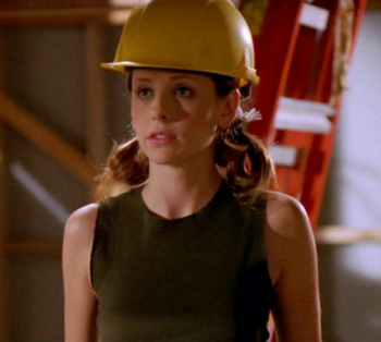 Buffy in a hard hat looking cute.