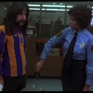 Harry Shearer at the airport in This is Spinal Tap